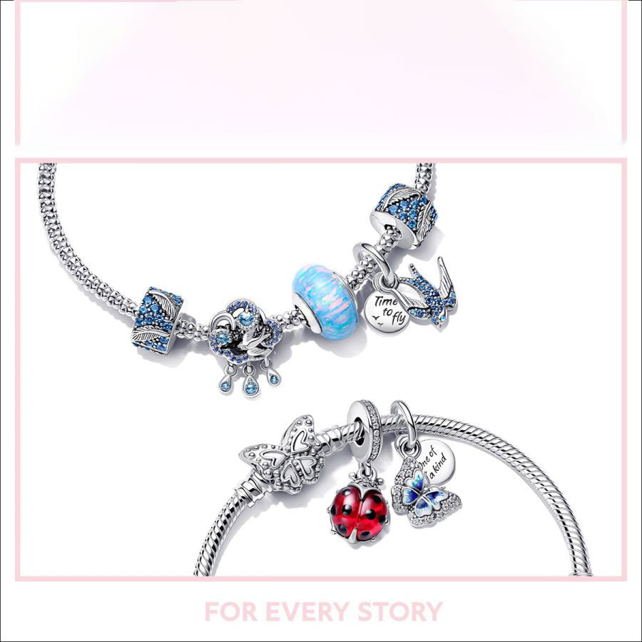 Charm Blaue geschwungene Feder Sterling-Silber